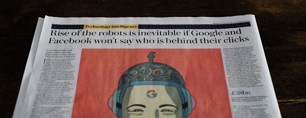 Newspaper headline about Facebook and Google being sued over privacy violations
