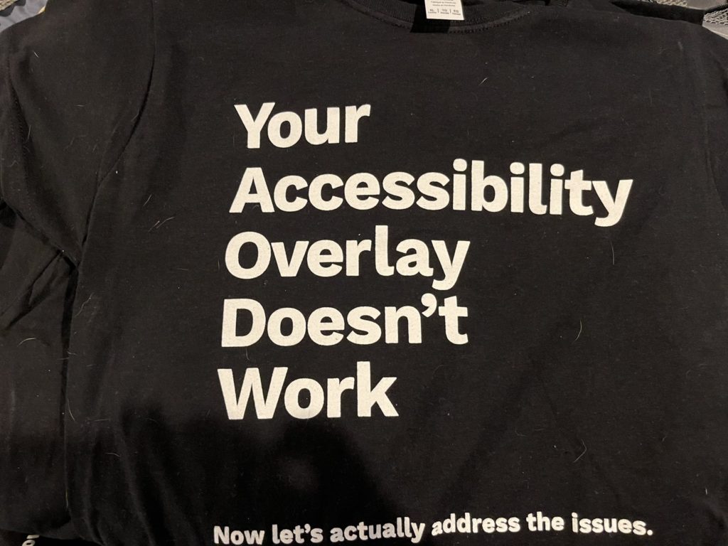 A t-shirt that says "Your accessibility overlay doesn't work. Now let's actually address the issues."