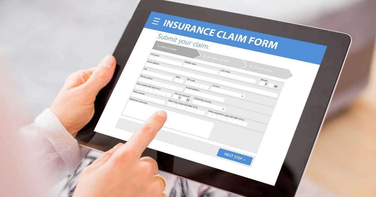Person filling out an online insurance form